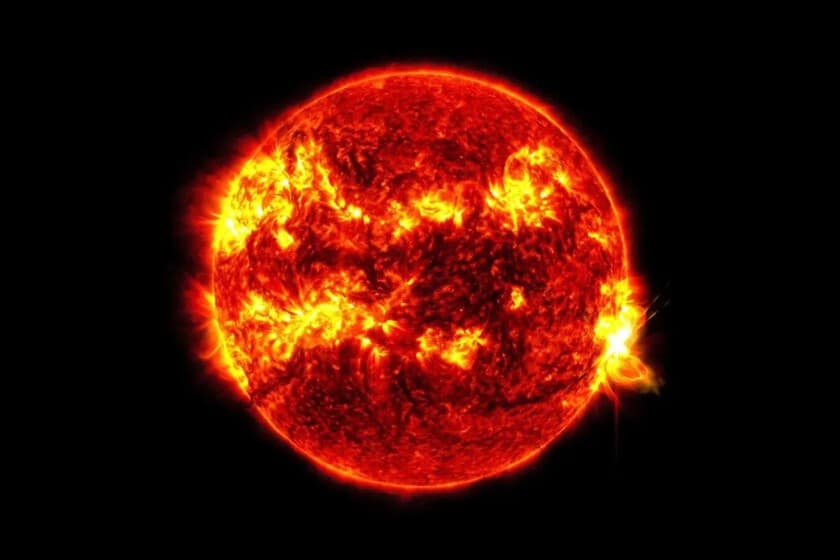 Imagen del Sol con una llamarada solar y gráficos de datos en superposición