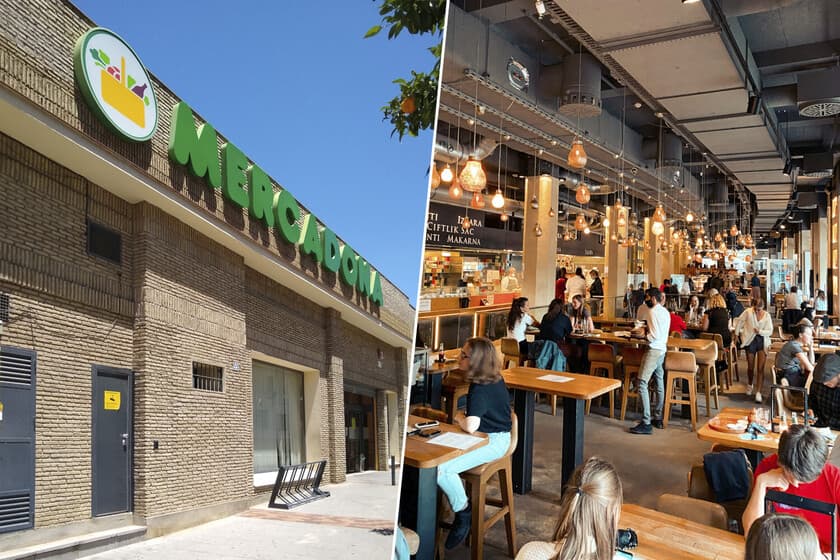 Fachada de un supermercado Mercadona con zona de restauración y clientes comiendo