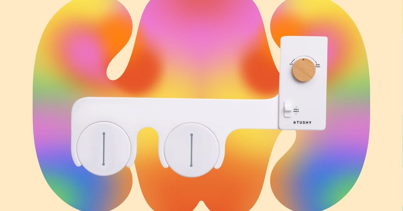 Bidet Tushy Classic Wave instalado en un inodoro blanco, con control de perilla y diseño minimalista.